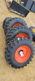 NEW CAMSO 12X16.5  SKID STEER TIRES ON RIMS