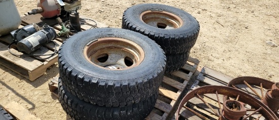 (4) -235/85R16 TIRES AND RIMS