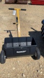 NEW - UNUSED YARD WORKS WALK BEHIND SEEDER