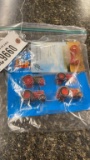 BAG OF CASE AND FARMALL TOY TRACTORS