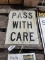 Pass With Care Metal Sign