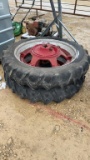 11.2 X 38 TIRES ON FARMALL H RIMS AND CENTERS