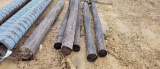 (6) USED WOODEN POSTS