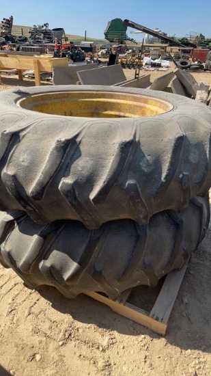 (2) FIRESTONE 16.9 X 34 TIRES ON JOHN DEERE RIMS