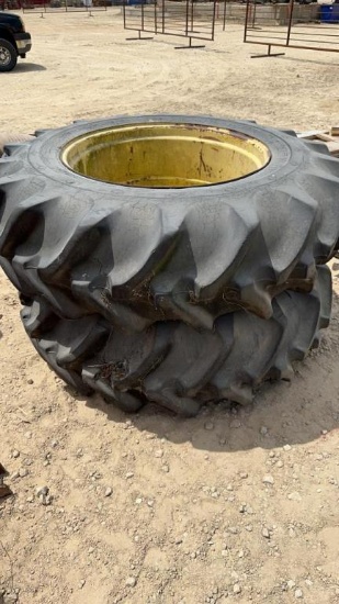 (4) 20.8-38 TIRES ON RIMS WITH CENTERS CUT OUT