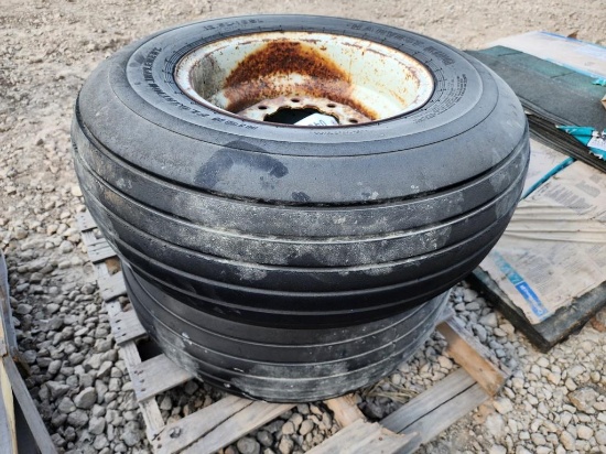 (2) 12.5 X 16 FLOTATION TIRES ON 8 HOLE RIMS