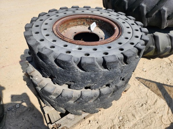 (2) SOLID RUBBER TIRES
