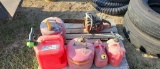 ECHO 550EVL CHAINSAW AND (5) GAS CANS