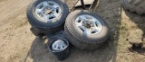 (4) 245/7517 TRUCK TIRES AND RIMS