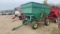 Gravity flow wagon on running gear.