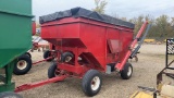 Gravity flow wagon on running gear w/ side auger-