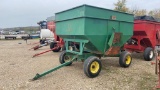Gravity flow wagon on running gear.