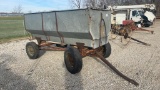 Flared bed wagon w/ hoist on running gear.
