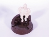 1930s Michelin Tires automotive garage ashtray featuring the Michelin Man. Made of Bakelite. Size: 5