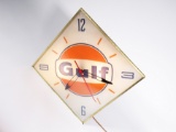 Desirable 1963 Gulf Oil glass-faced light-up service station clock. Lights and works perfectly. No c