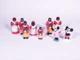 Lot of three1950s black face salt and pepper shakers and a set of Mickey/Minnie Mouse shakers.