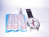 Lot of three NOS tin thermometers, Mickey Mouse wall clock and a 1930s oil bottle spout.