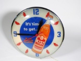 Fabulous 1956 Kist Orange Soda glass-faced light-up clock with bottle graphic by Pam Clock Company.