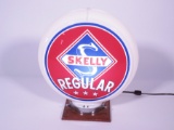 Very clean 1950s Skelly Oil service station gas pump globe in a Capcolite body. Both lenses are very