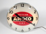 1950s American Amoco Gas light-up service station clock by Pam Clock Company. Small hairline vertica