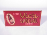 Mint 1940s Vic's Special Beer single-sided celluloid tavern sign with cardboard back. Built in easel