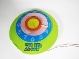 1970s 7-up three-dimensional electric wall clock. Appears to still function. Size: 16