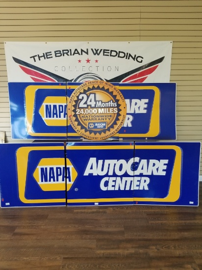 MISC NAPA SIGNS. Two "NAPA autocare" signs measuring 103"x34" and one 35" warranty sign