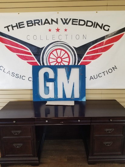 "GM" embossed acrylic single sided sign. 35"x24"