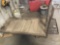 METAL CART WITH WOOD IN CENTER ON WHEELS