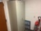 DOUBLE DOOR METAL CABINET, WITH CONTENTS, IN MENS RESTROOM