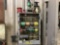 WIRE RACK WITH ROLLS OF WIRE