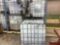 8 PLASTIC BINS ON METAL PALLET WITH CAGE