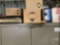 STORAGE CABINET WITH SAND PAPER, PAINT GUN, BONDO SPREADERS, POLISH,