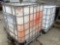 2 PLASTIC STORAGE BINS ON A METAL PALLET WITH CAGE