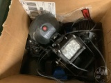 A BOX OF RECHARGEABLE LIGHTS
