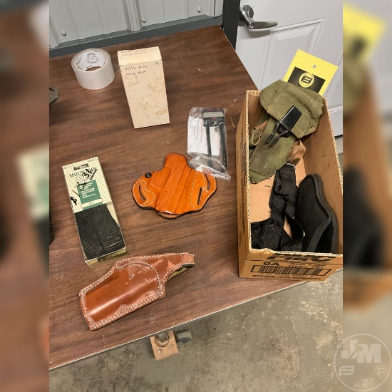 BOX OF MISC HOLSTERS GUN LOCKS