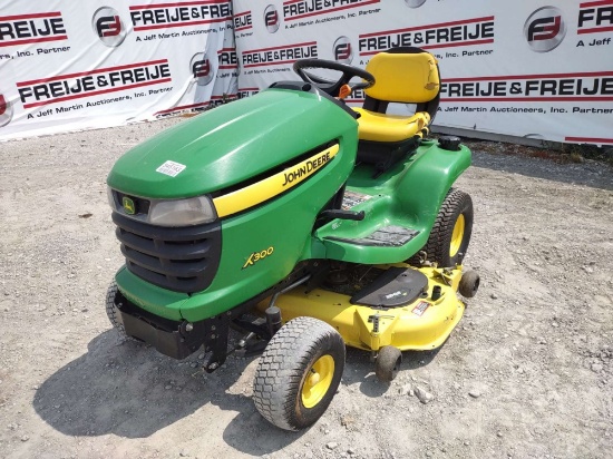 2011 JOHN DEERE X300 RIDING MOWER SN: 1M0X300CLBM203975