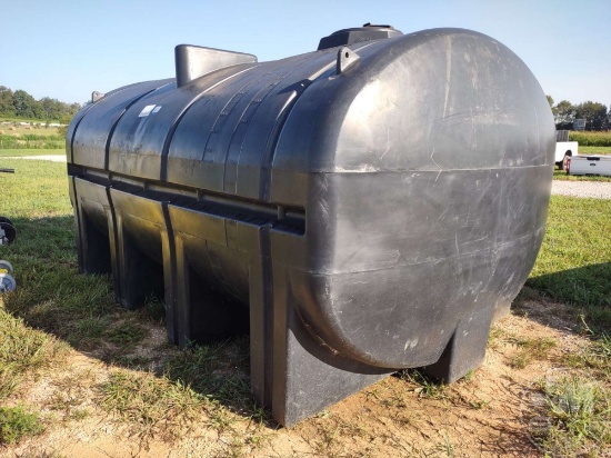 BLACK HORIZONTAL ELLIPTICAL LEG TANK, HOLDS AROUND 3,250 GALLONS.