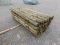 (1) BUNDLE OF WOODEN FENCE POSTS