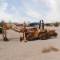2002 CASE 560 RIDE-ON TRENCHER