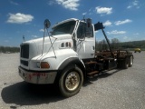 2000 STERLING TANDEM AXLE ROLL-OFF TRUCK