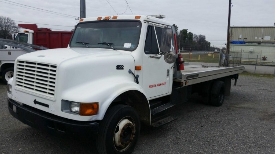 1997 INTERNATIONAL 4700 ROLLBACK