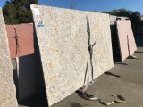 GRANITE SLABS, QUARTZ REMNANTS & METAL A-FRAME