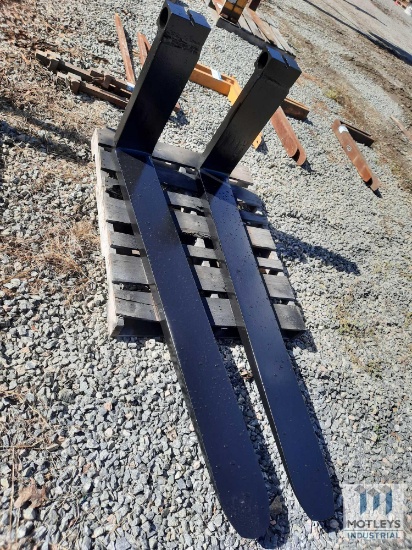 A Set Of 5' 10" Wheel Loader Forks