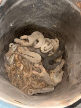 Lot of Assorted Industrial Hooks and Chains in Metal Bucket