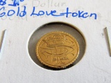 One Dollar Gold Piece made into a love token.