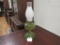 Green glass oil lamp