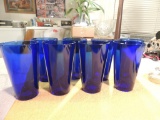 Eight cobalt blue glasses