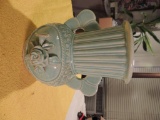 Pottery vase with embossed roses