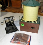 Lionel Water Tower with a crane and barrels
